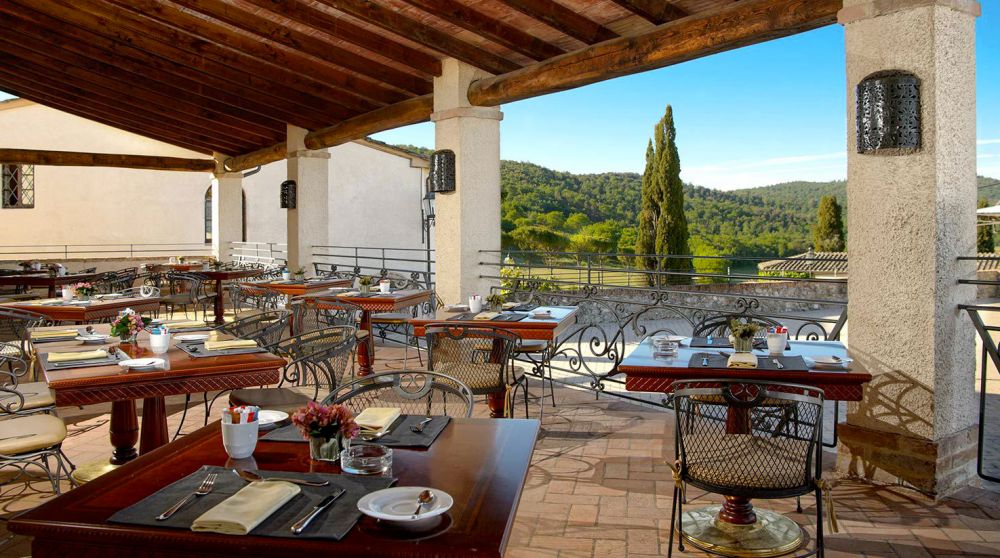 Breakfast on the terrace at the hamlet for wedding in Tuscany