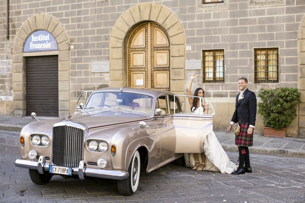 Bride and groom with old-timer in Florence