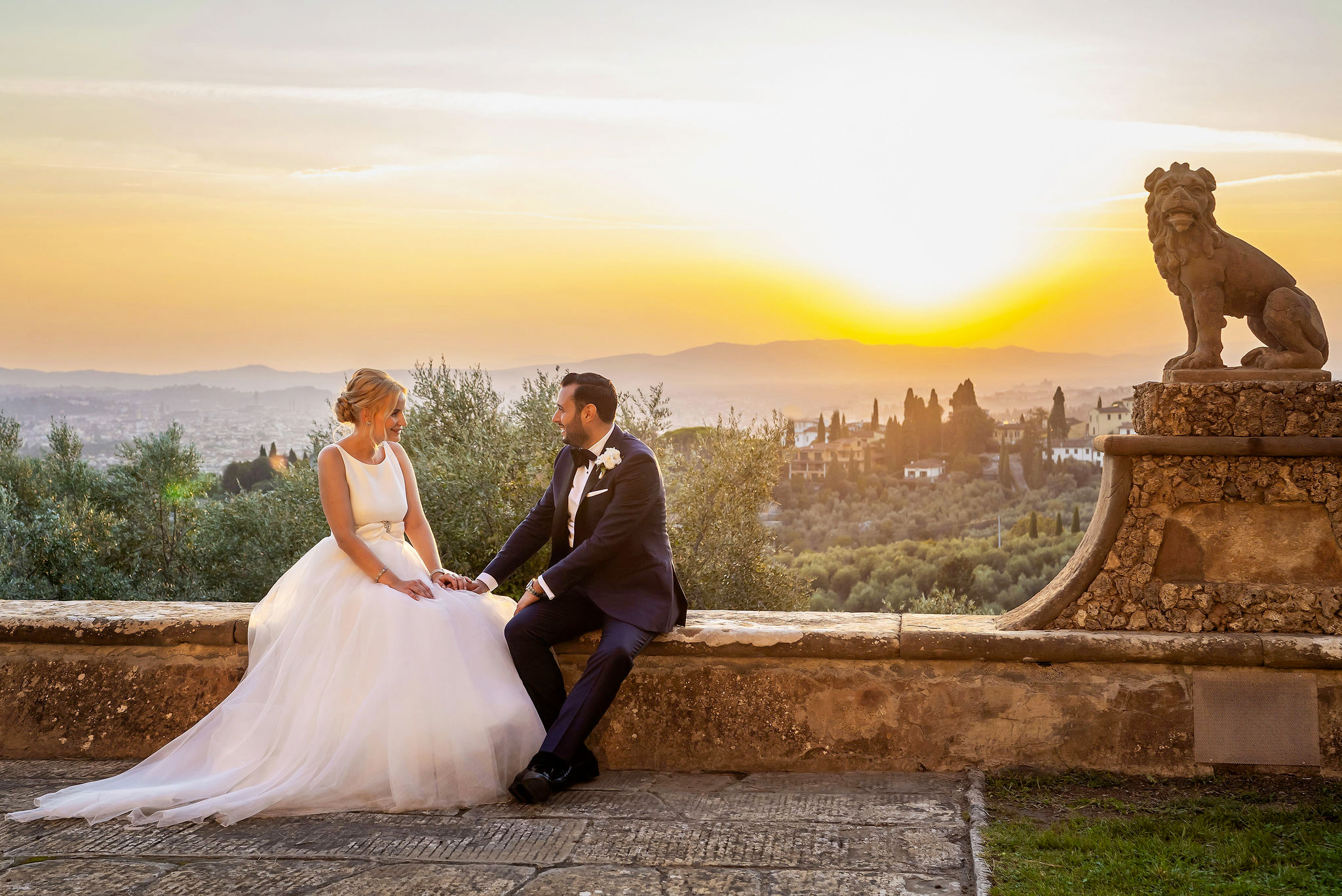 Bride and groom under the Tuscan sunset