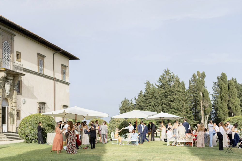 Cocktail hour at the panoramic villa in the Tuscan countryside