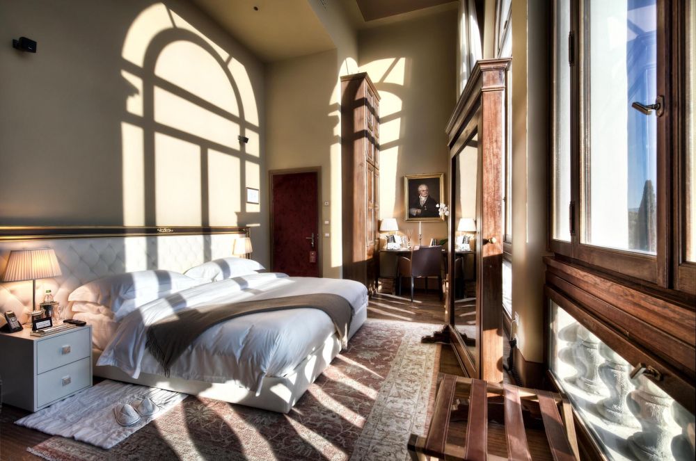 Cream and brown bedroom at the luxurious wedding hotel in Florence