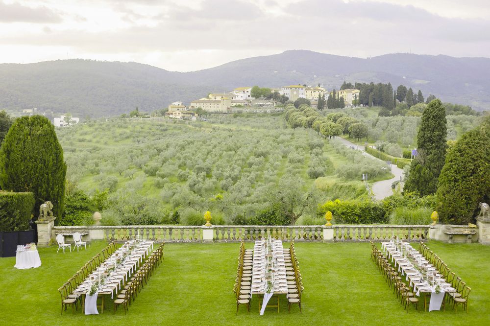 Dinner tables and view of the countryside at the Villa Medicea in Tuscany