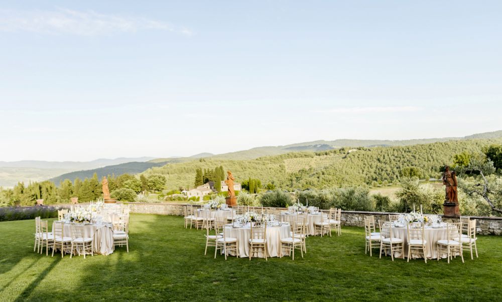 Dinner tables in the garden of the romantic wedding farmhouse in Tuscany