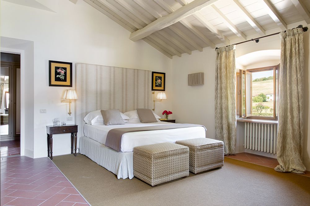 Ecru bedroom at the luxury wedding resort in the Tuscan countryside