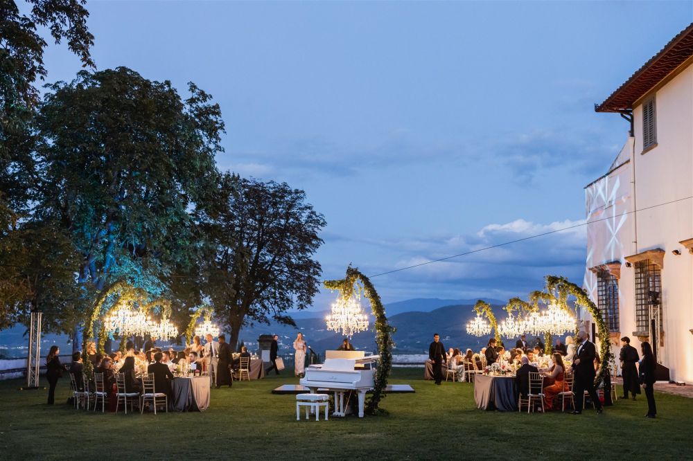 Dinner in the garden at the wedding villa in Florence with view