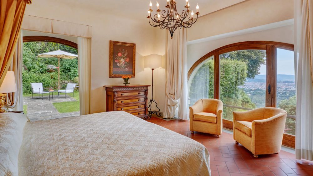 Ivory bedroom at the wedding villa in Florence with view