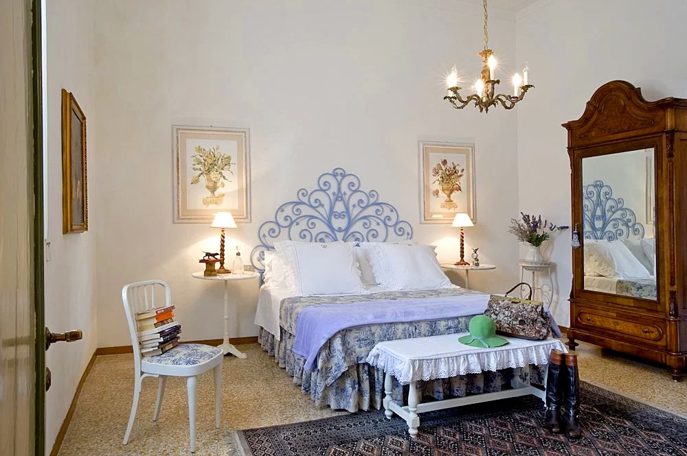 Light blue bedroom at the romantic villa in Tuscany