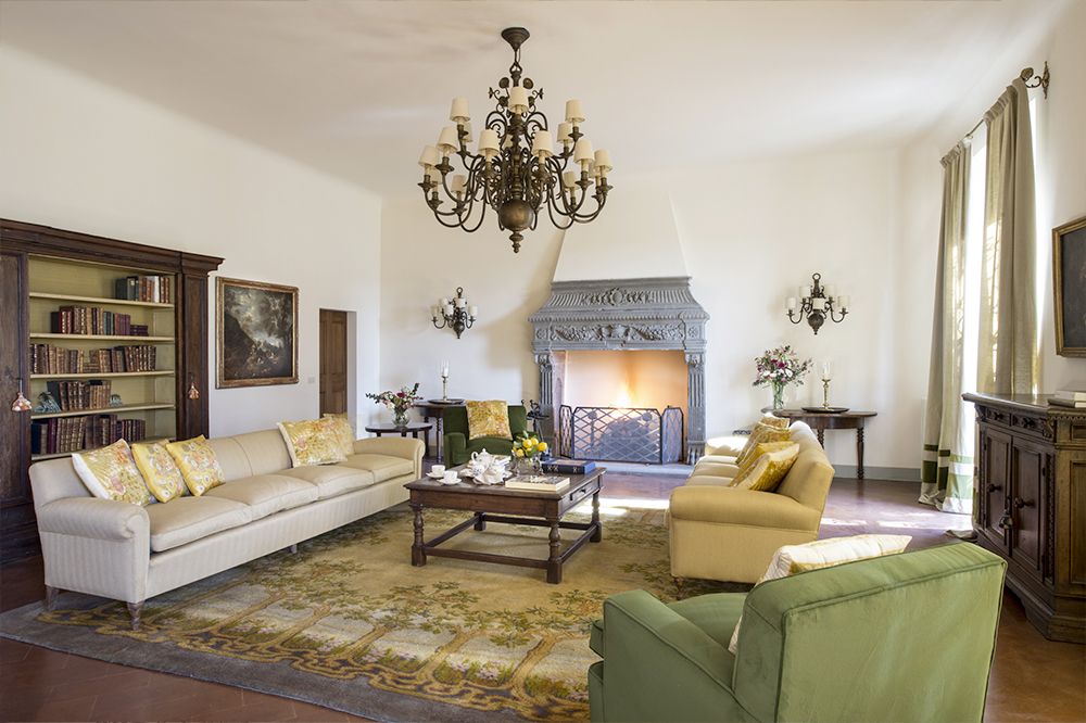 Living room with fire place at the luxury wedding resort in the Tuscan countryside