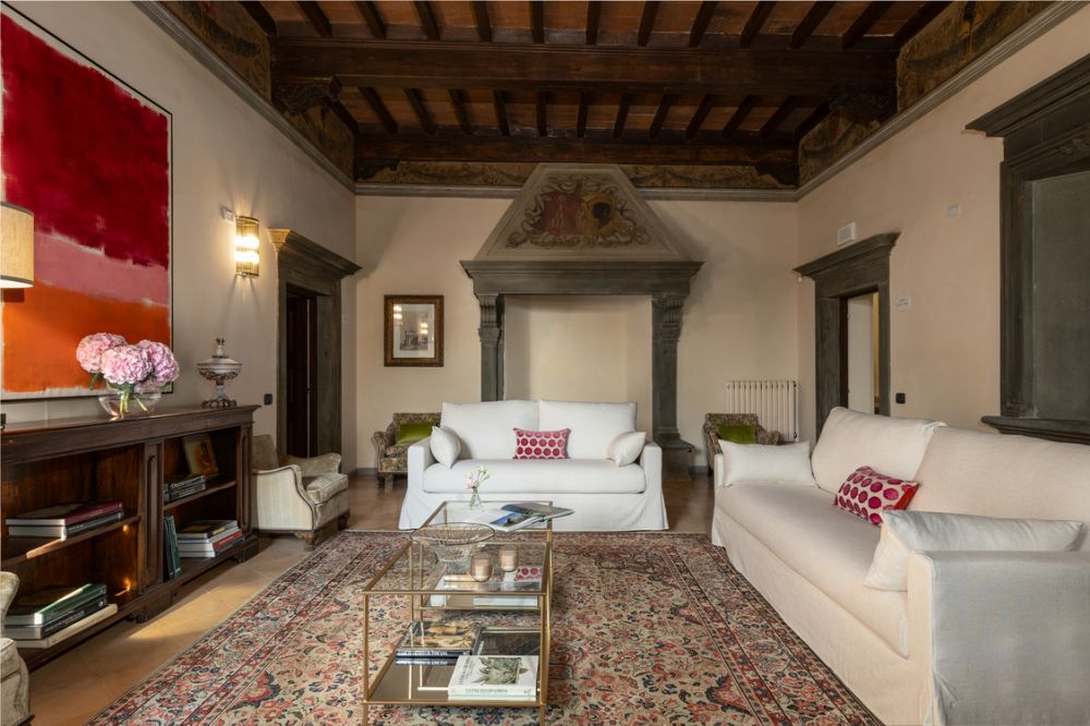 Living room with sofas at the wedding castle in the Tuscan countryside