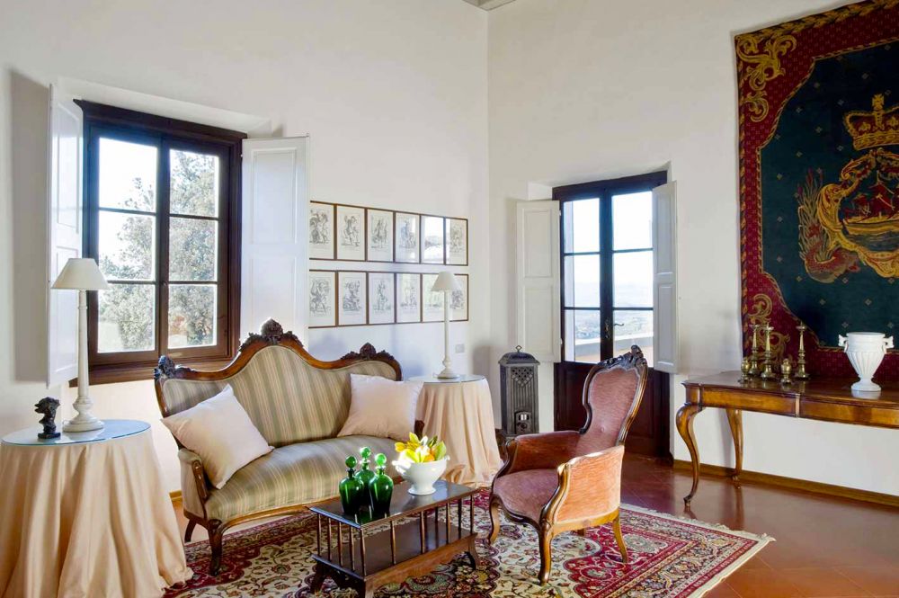 Living room with view at the romantic villa in Tuscany