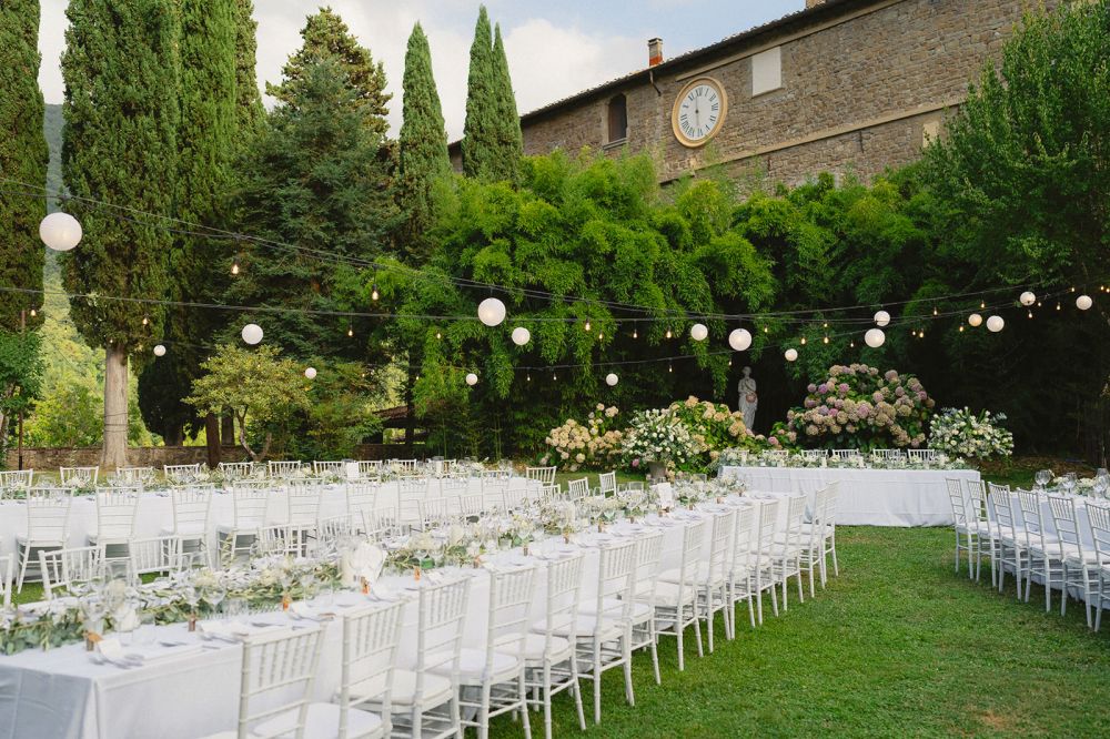 Long tables with lanterns at the wedding villa in Florence