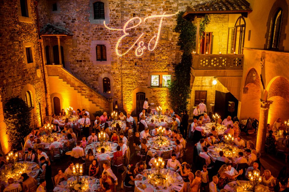 Night wedding dinner at the Medieval castle in Tuscany