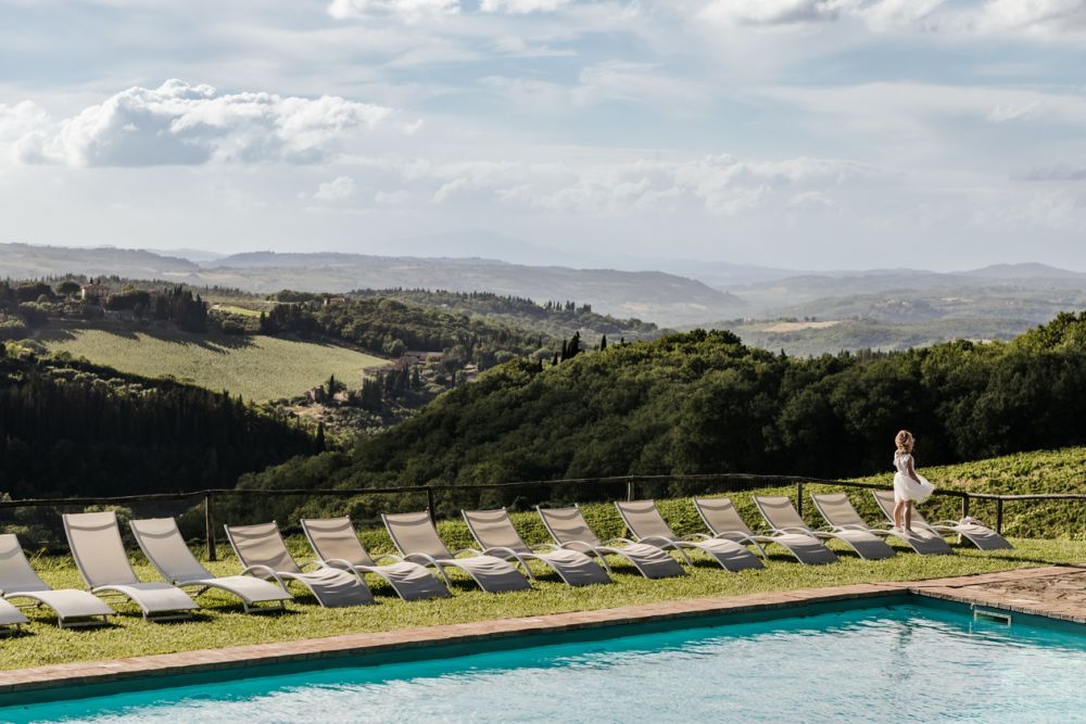 Pool with view at the romantic wedding farmhouse in Tuscany