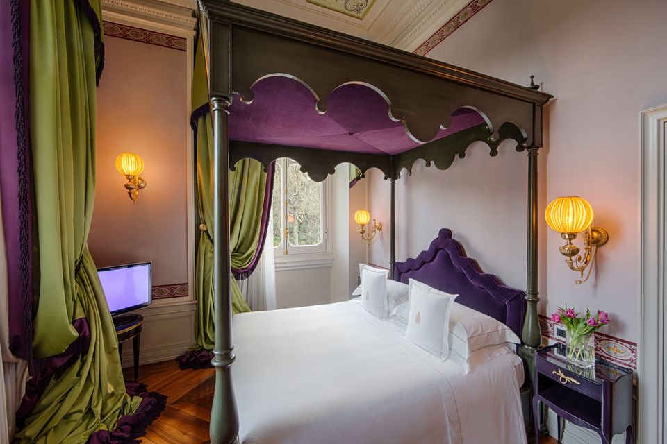 Purple bedroom at the luxury wedding hotel in Florence