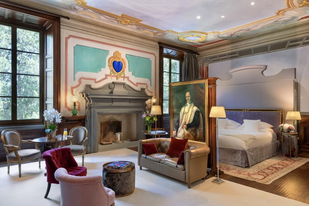 Suite with frescoes at the luxurious wedding hotel in Florence
