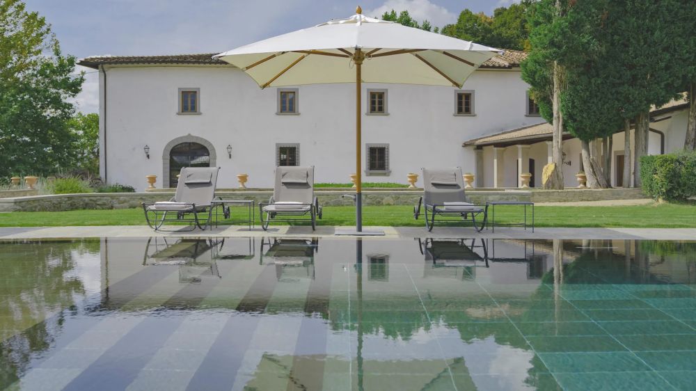 View of the villa and the pool at the luxury wedding resort in the Tuscan countryside