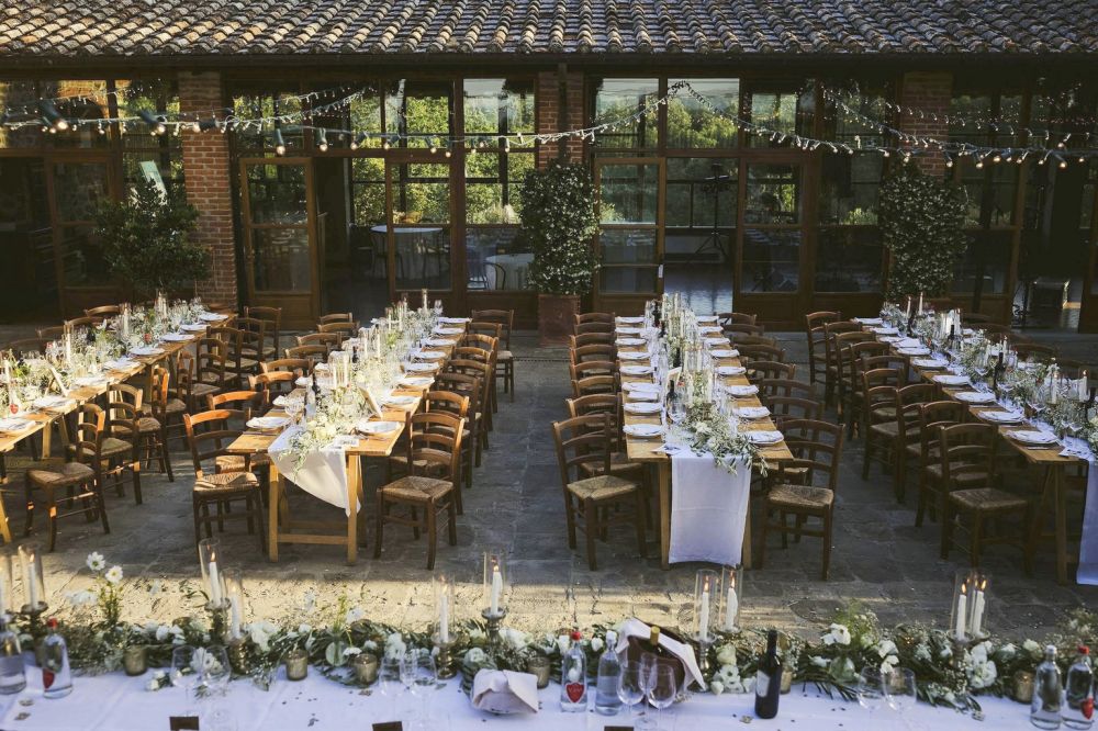 Wedding dinner tables at the farmhouse for weddings inTuscany