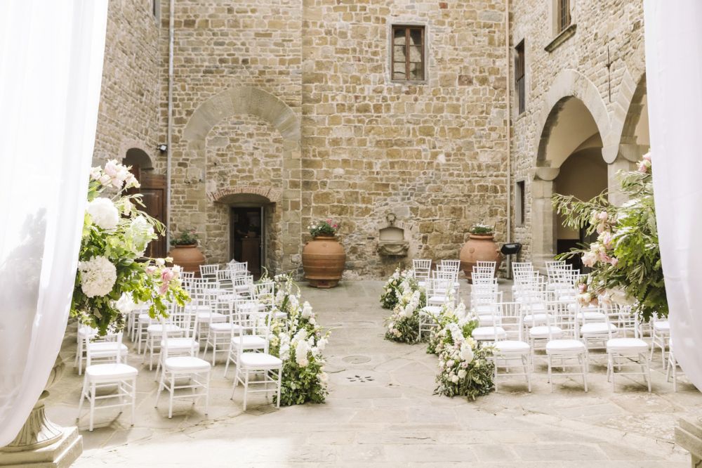 White ceremony in the courtyard at the wedding villa in Florence