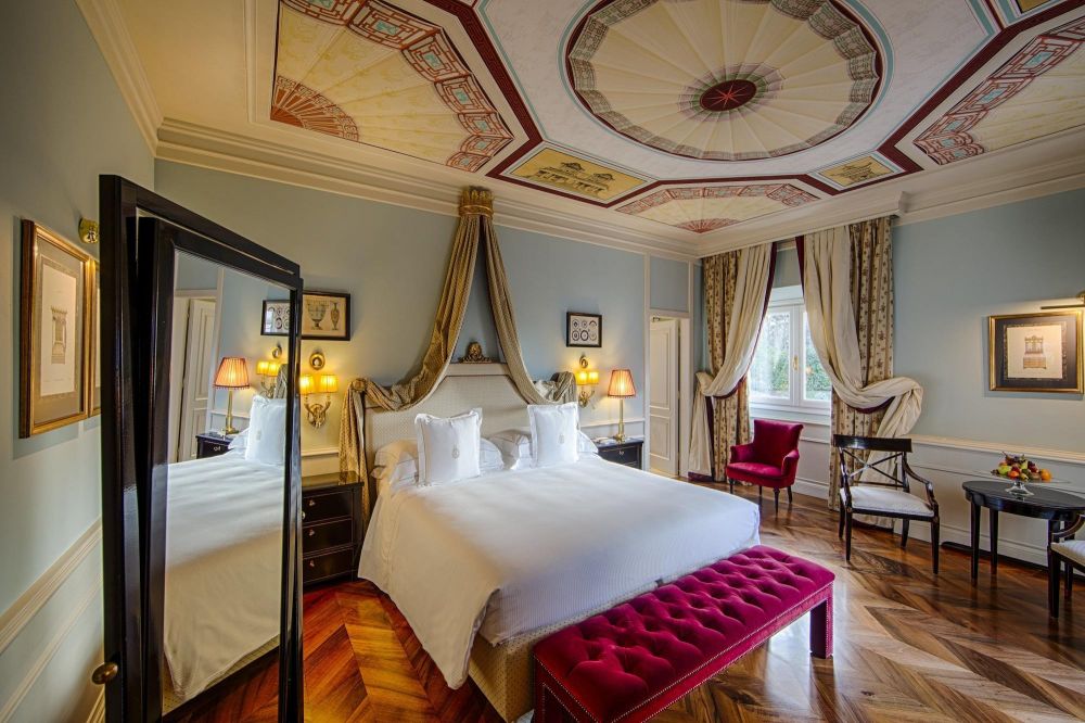 White and red bedroom at the luxury wedding hotel in Florence