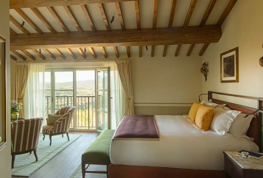 Yellow and green bedroom at the San Gimignano wedding resort